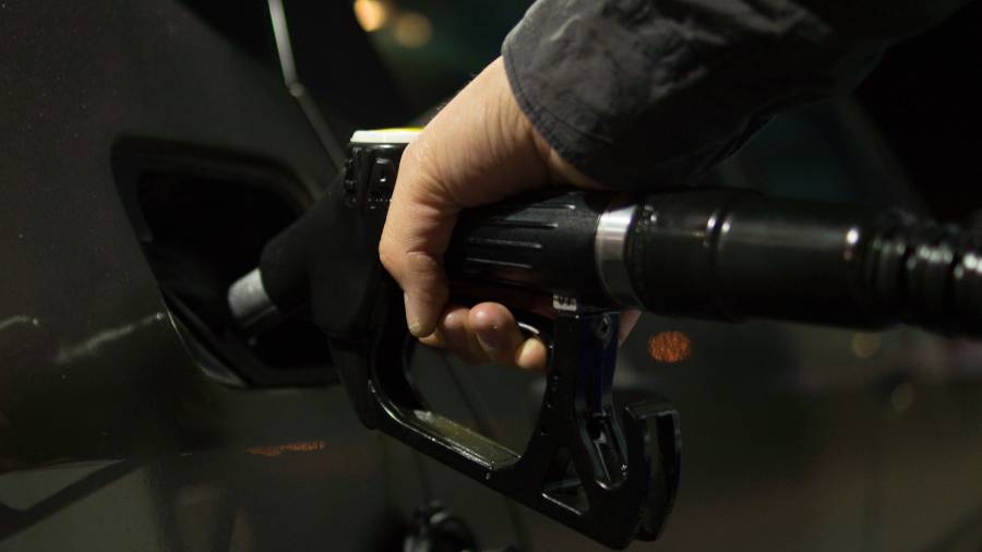 How should firms handle staff who refuse to travel into work to save petrol?